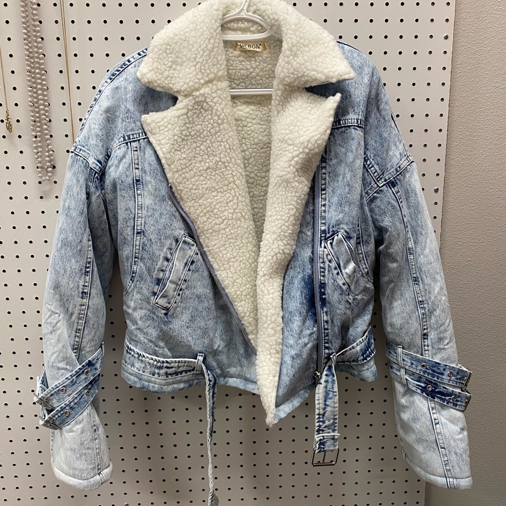A blue jean jacket.